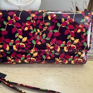 Mundi Floral Patterned wristlet.